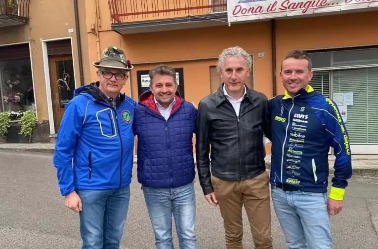 Ercole Storti, Ermanno Anselmi, Luciano Marcazzan e uno degli organizzatori